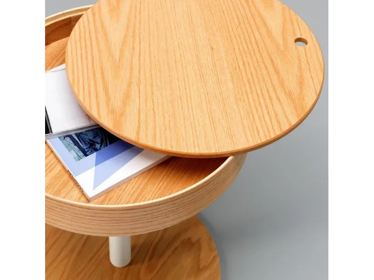 Tavolino Secret con top estraibile in legno curvato e struttura in metallo verniciato di Stones
