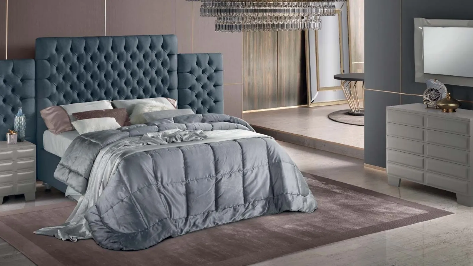 Letto dal design elegante con imponente testiera in tessuto trapuntato Tosca di Stilfar